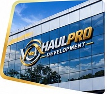 Visual identitas HaulPro Development pada gedung